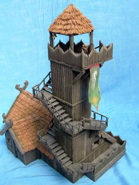 Impresionante construccion de una casa fortaleza con una atalaya muy alta adosada en Rohan. 