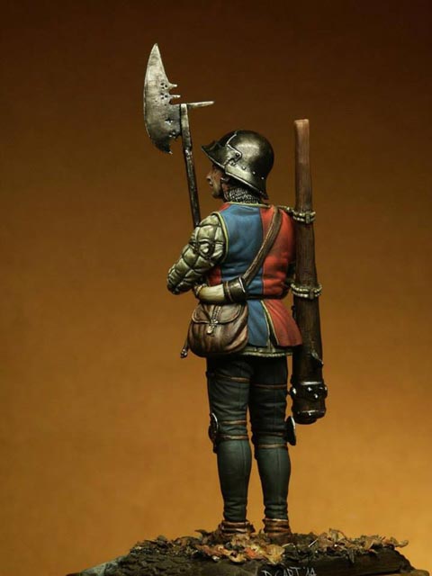 Mercenario Renacentista portando una bombarda o cañón de mano y una alabarda
