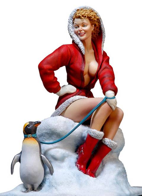 Figura de la casa de miniaturas, Andrea Miniatures a escala 80 mm, 1/16 representado a una de las chicas pin up en el modelo de Chica Santa Claus Navideña, sentada sobre un pedazo de hielo y llevando como mascota un pinguino. 
