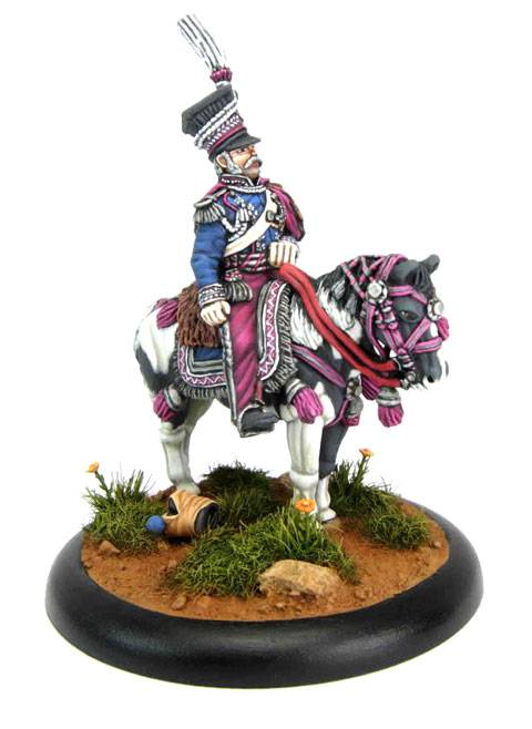 La miniatura representa a la figura del Príncipe Josef Poniatowski montado a caballo en uniforme de media gala en combate.