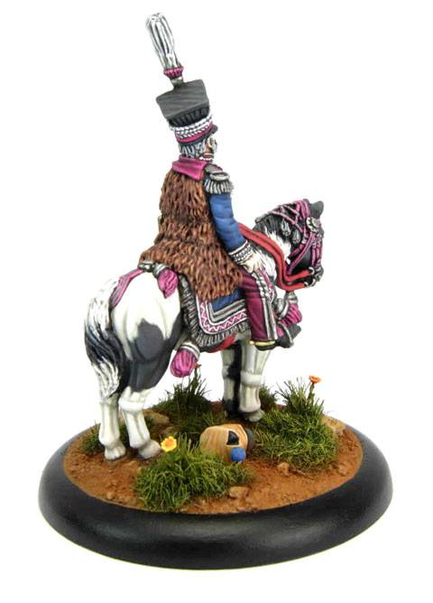 La miniatura representa a la figura del Príncipe Josef Poniatowski montado a caballo en uniforme de media gala en combate.
